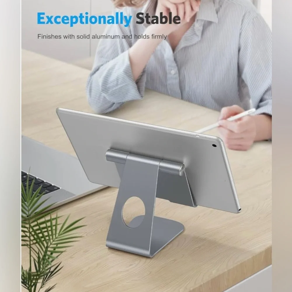 iPad/ Tablet stand holder. Angle adjustable. Aluminum. Excellent condition.